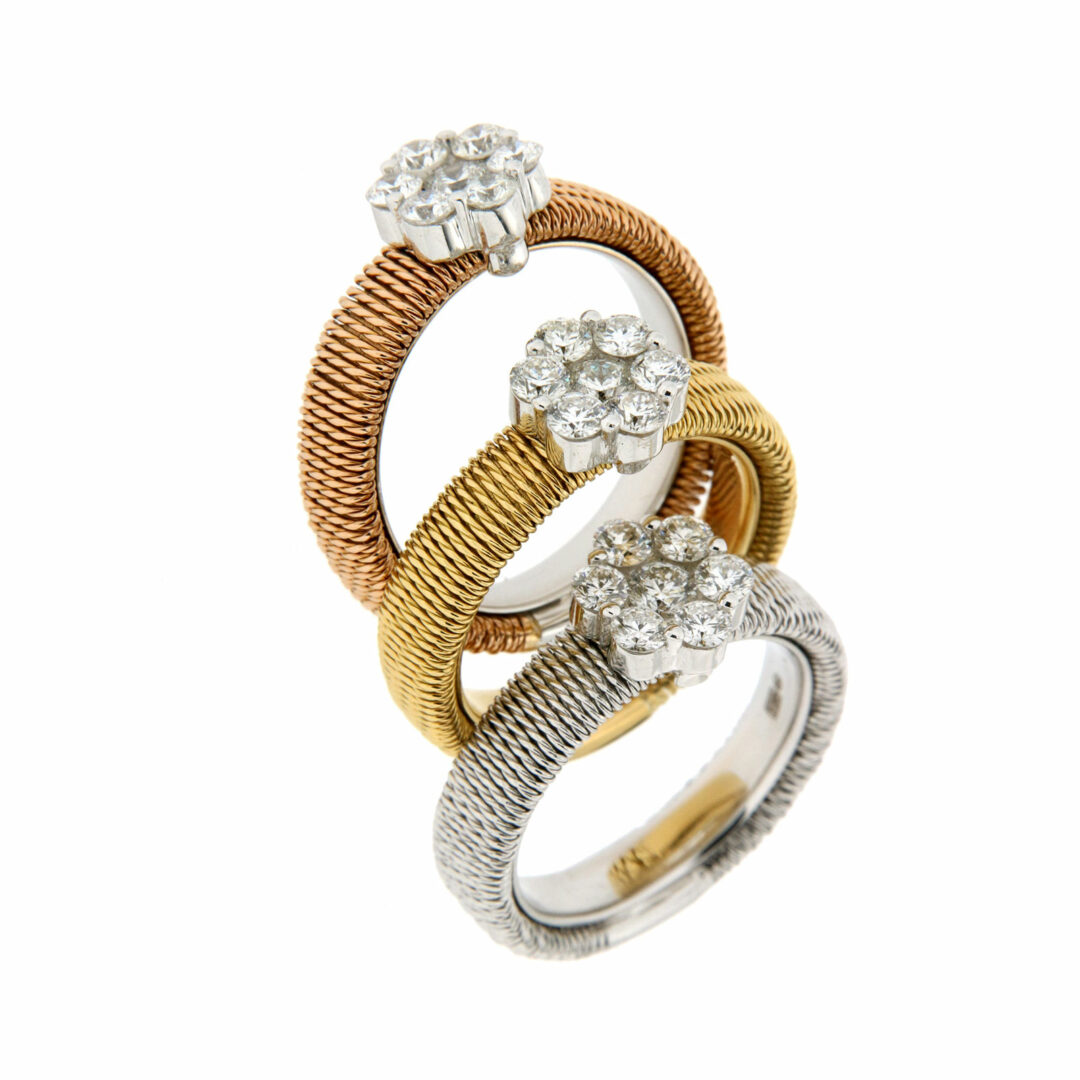 Χειροποίητο δαχτυλίδι του ιταλικού οίκου Oro Trend. Ροζ χρυσός 18 καρατίων με 7 λευκά brillants συνολικού βάρους 0,70 ct.